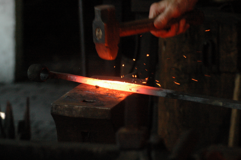 Blacksmith at anvil